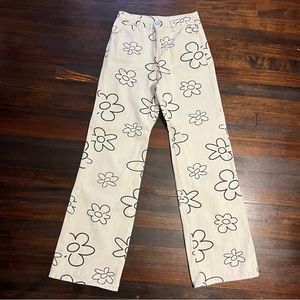 Bailey Rose Off White boot cut high waisted jeans with black flower print